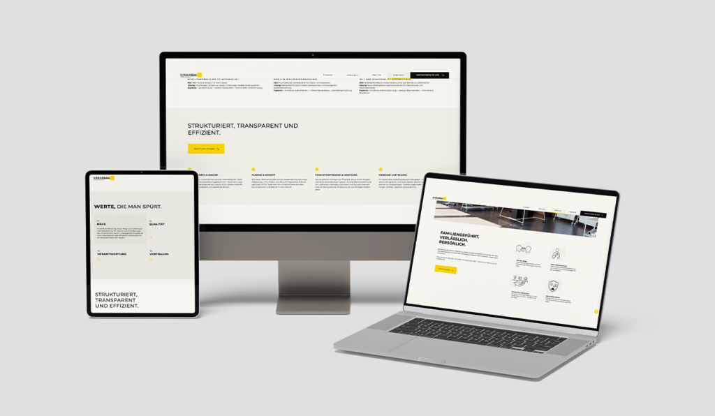 Website eines Büroplaners auf Monitor, Laptop und Tablet